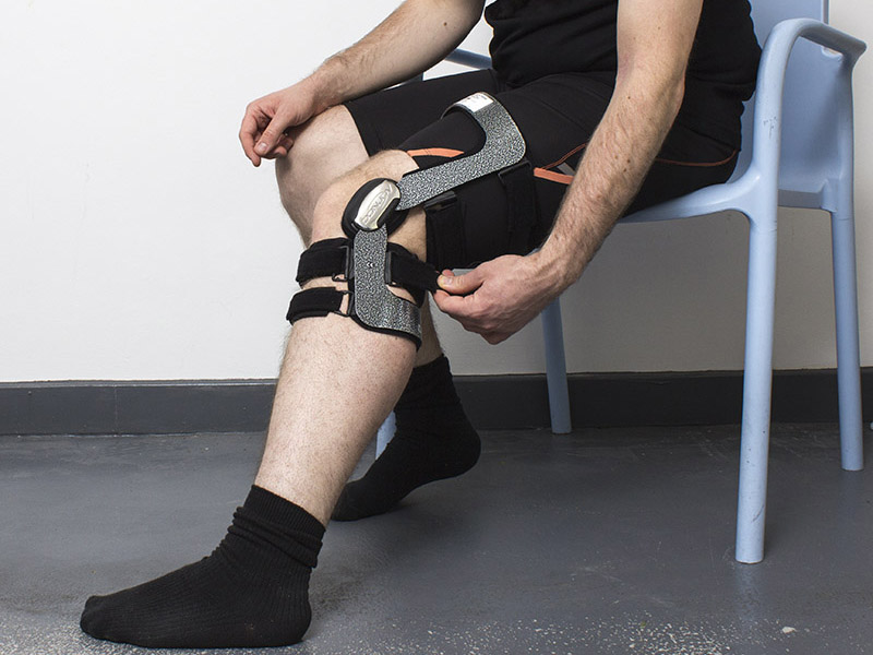Tighten Strap 5 at the back of the calf