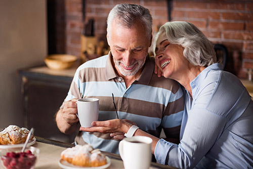 Elderly Couple Enjoying Breakfast