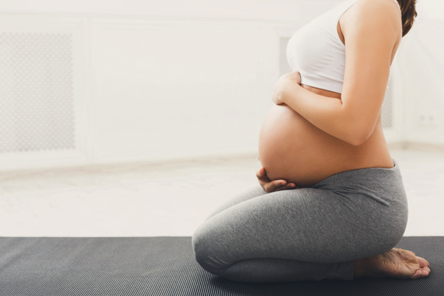 Healthy Pregnant Woman Doing Yoga